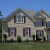 Sienna Plantation Vinyl Siding by LYF Construction